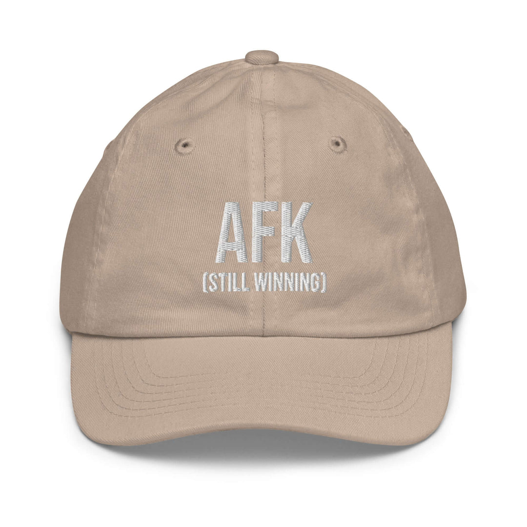 AFK youth baseball cap in beige with embroidered text AFK (STILL WINNING) on the front.